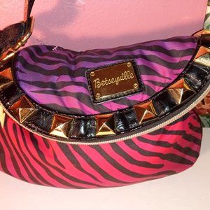 BETSEVILLE PURPLE, PINK/ BLACK STRIPPED CROSSBODY PURSE TRIMMED IN GOLD HARDWARE